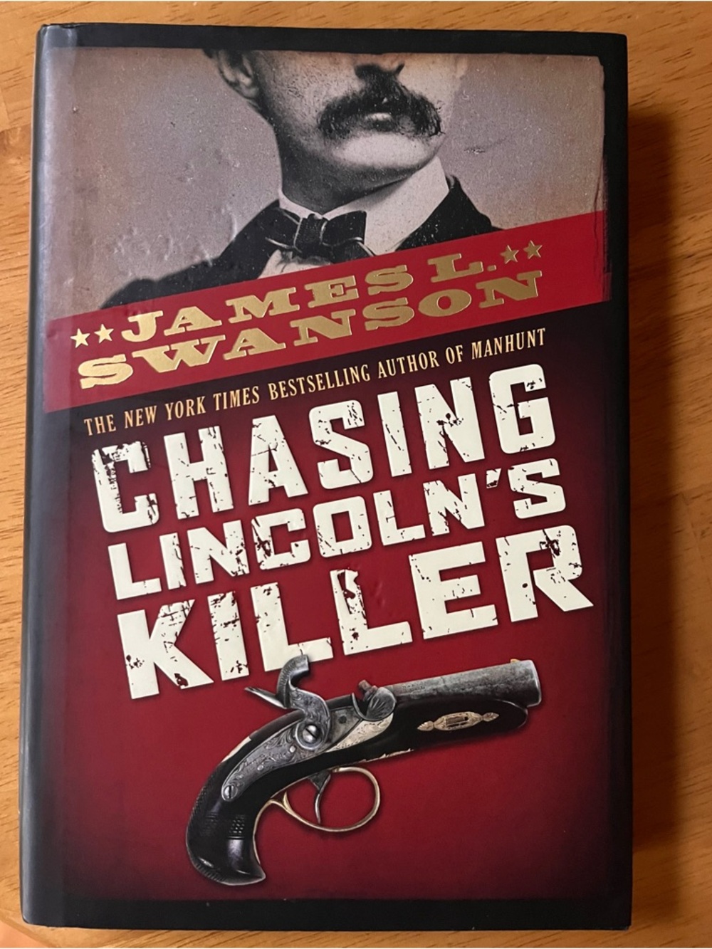 James L. Swanson "Chasing Lincoln's Killer" Hardcover - Red & Black
